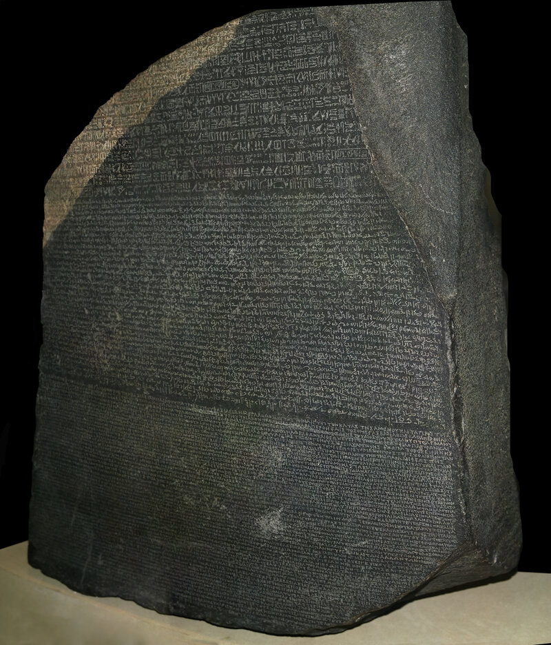 The Rosetta Stone on display at the British Museum, inscribed with a decree in three scripts: Ancient Greek, Demotic, and hieroglyphic